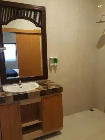 Asiana Lovina Hotel - Badezimmer