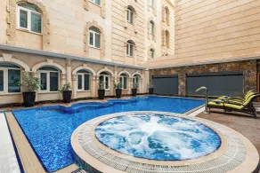 Grand Regency Doha, Trademark Collection by Wyndham - Piscine