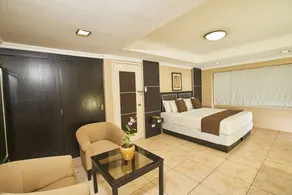 Orchid Garden Suites - Chambre