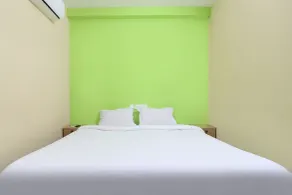 Fabhotel Elite Inn - Zimmer