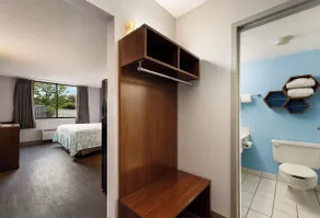 HomeTowne Studios by Red Roof Painted Post - Room
