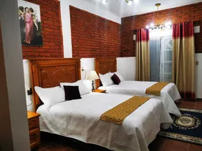 Hotel Boutique Casona Mashei - Habitación