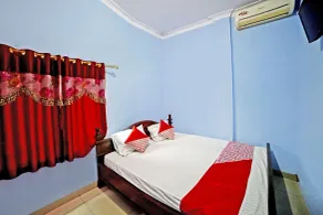 Hotel O Gurusinga Guesthouse - Chambre