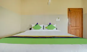 Treebo Green Land Coorg - Chambre