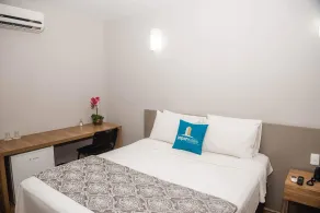 Ímpar Suítes Expominas - Room