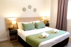 Soltigua Apart Hotel Mendoza - Zimmer