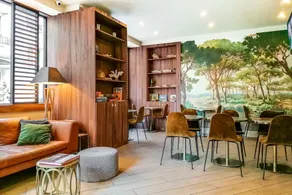 Hôtel de France, un hôtel AMMI - Coin salon dans le hall