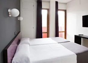 Hospedium Hostal Un Punto Chic - Chambre