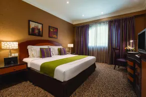 Grand Regency Doha, Trademark Collection by Wyndham - Chambre