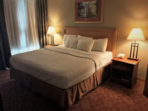 Host Inn an All Suites Hotel - Chambre