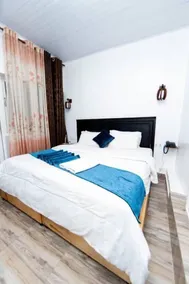 INZOZI AFRICA HOUSE B&B-Gishushu - Zimmer