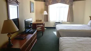 Palace Inn & Suites - Chambre