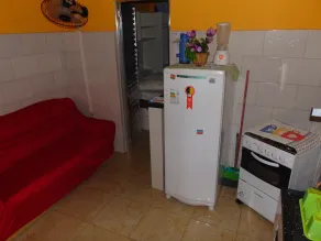 Kitnets com AR Condicionado na Praia - Chambre