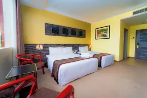 HIG Hotel & Convention - Zimmer