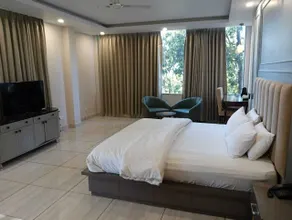 The Green Icon Resort - Zimmer