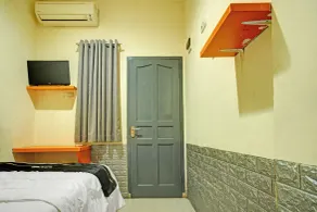 Hotel O near Taman Wisata Alam Punti Kayu formerly Ivy Hotel - Værelse