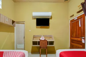 Reddoorz Syariah at House Of Melati Kepanjen - Habitación