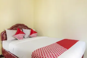 Hotel O Grand Suites Palace Syariah - Habitación