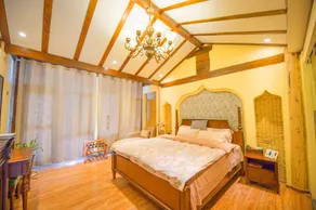 Shan Ju Qiu Ming Floral Hotel in Tengchong 花筑 腾冲山居秋暝精品客栈 - Zimmer