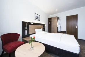 Astor & Aparthotel - Chambre