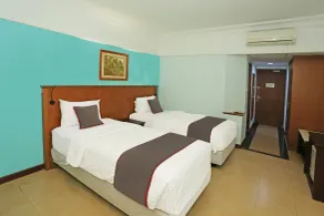 Collection O 91898 Series Hotel Kuningan - Habitación