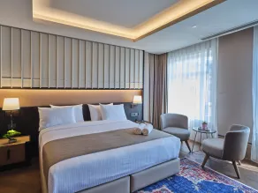 Four-G Hotel Premium - Chambre