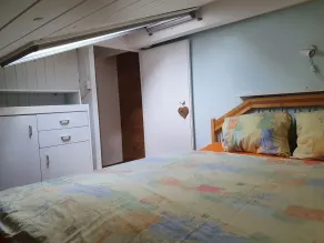 Appartamento bilocale per vacanze con giardino, 2-4 persone a Emmetten - Camera