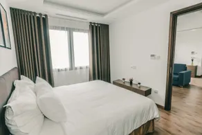 HNC Premier Hotel & Residences - Chambre