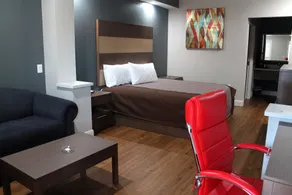 Grand Villa Inn and Suites Westchase/Chinatown - Chambre