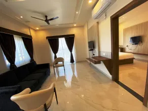 The Grand Sarovar Inn and Suites - Room