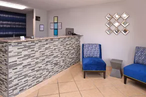 Americas Best Value Inn Monroeville - Siddeområde i lobbyen