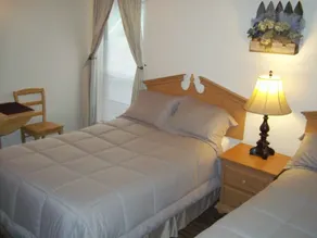 Village Lodge - Chambre
