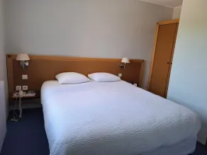 Logis Hotel Le Cygne - Zimmer