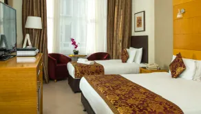 Park City Grand Plaza Kensington Hotel - Chambre