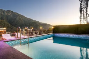 Hotel Pride Inn by Maps Hospitality - Near to Lakshman Jhula & Ghat - Pool