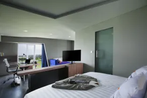 Berry Biz Hotel Sunset Road - Zimmer