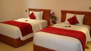 Al Madina Suites Doha - Chambre