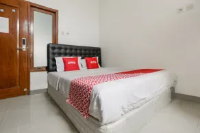 Hotel O Tamansari Guest House - Habitación