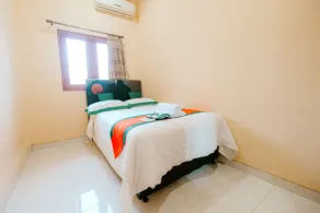 Homestay Syariah Pogung Dekat UGM by Simply Homy - Værelse
