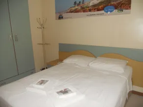 Condomínio Flat La Perla - Habitación
