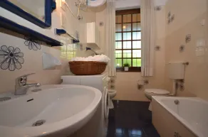 Villa Riva Beachfront - Badezimmer