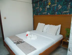 Whispering Palms Gardens, Hotel and Suites - Zimmer
