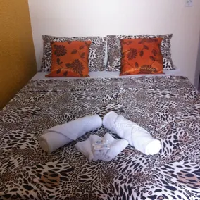 Praia da Costa Suítes - Room