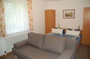 Haus am Wald * Appartamento con piscina * Prato * Adatto ai bambini * Spiaggia * - Camera