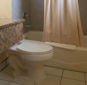 Budget Inn - Badezimmer