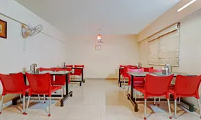 Treebo Akshaya Mayflower Vijaya Bank Layout - Restaurant