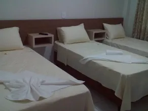 Conforto Plaza Hotel - Habitación