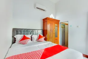 Orange inn RedPartner Madiun - Room