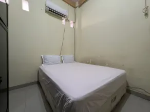 Hotel O Mely Homestay - Chambre