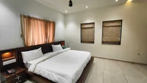 Asopalav Lawns - Chambre